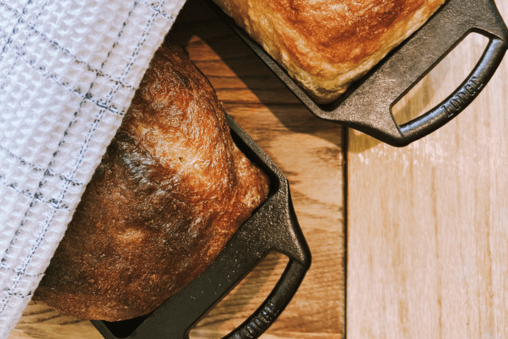 bread in cast iron loaf pans