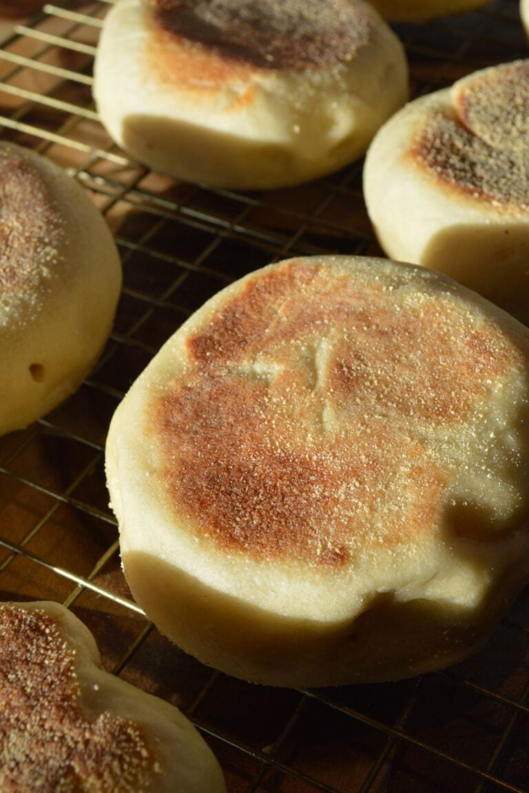 Sourdough english muffins on cooling rack