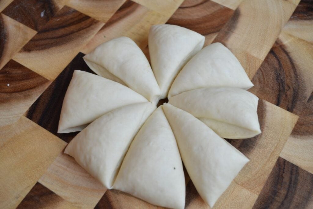 sourdough dough divided into 8 pieces