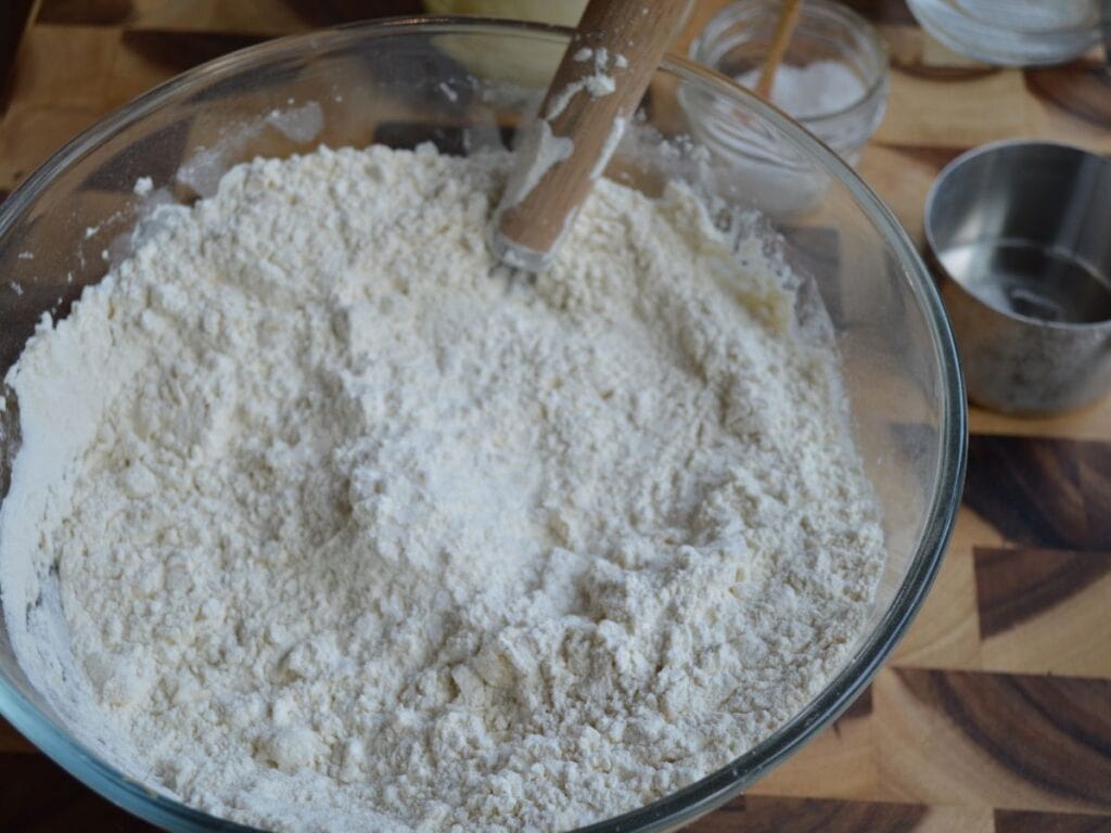Flour for sourdough bagel recipe being mixed in