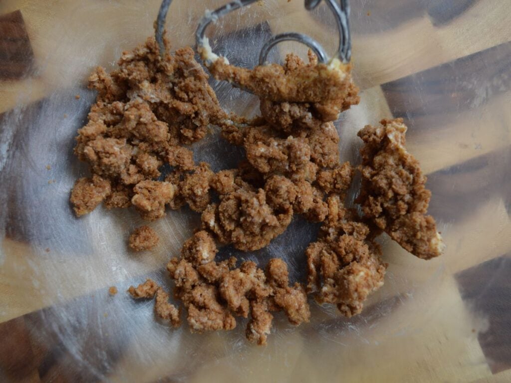 Butter and sugar being mixed together in bowl