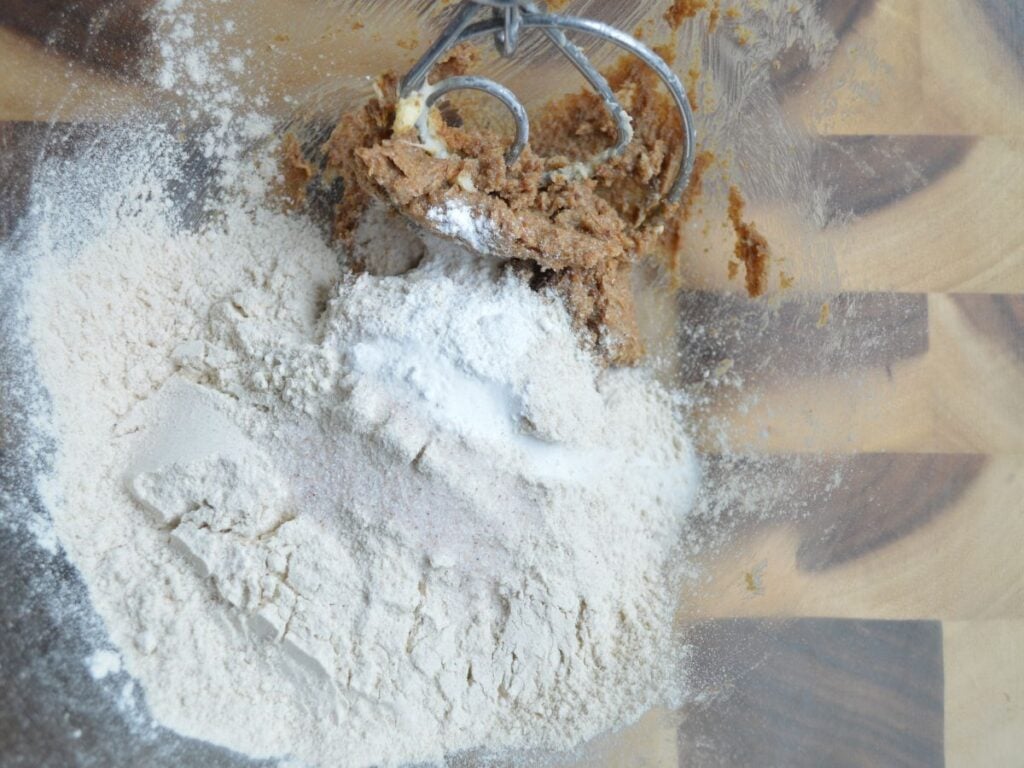 Flour added to the bowl with butter and sugar mixtureSourdough Graham Cracker Recipe